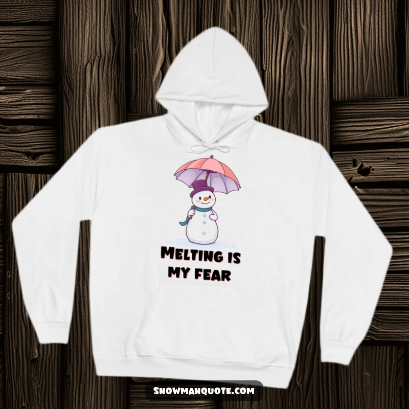 Funny hoodie showcasing a snowman comically struggling to hold onto a large umbrella as the wind tries to steal it.